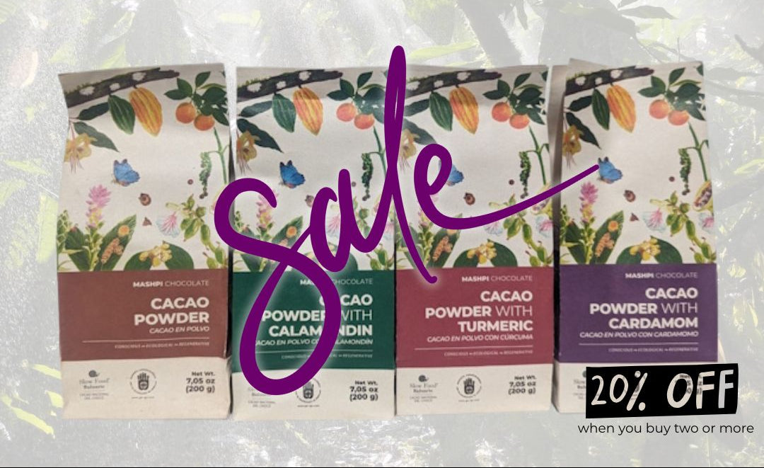Four packages of cacao powder with a &
