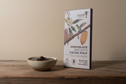 Mashpi chocolate bar packaging with cacao bean and hummingbird illustration